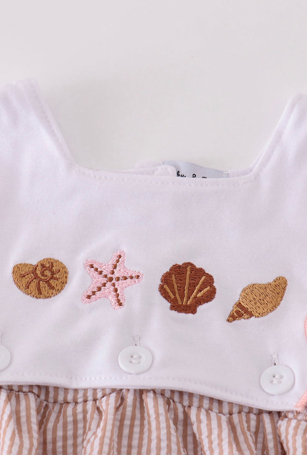 Brown shell starfish onesie